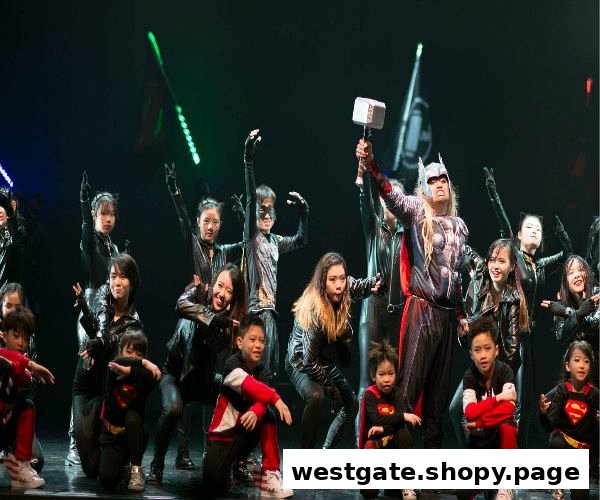 Students of DF Academy perform in superhero costumes on stage.