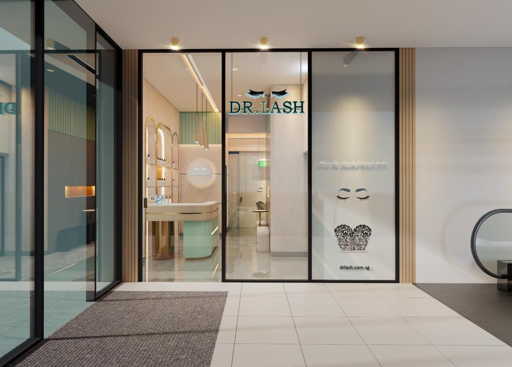 The modern glass storefront of DR. LASH, showcasing its elegant interior and branding.