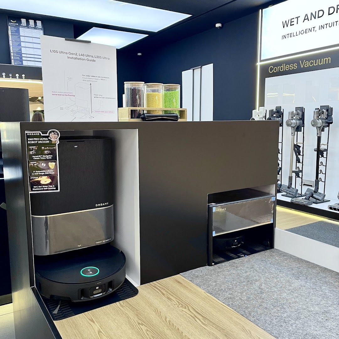 A modern Dreame store display featuring advanced robot vacuums and cordless cleaning solutions.