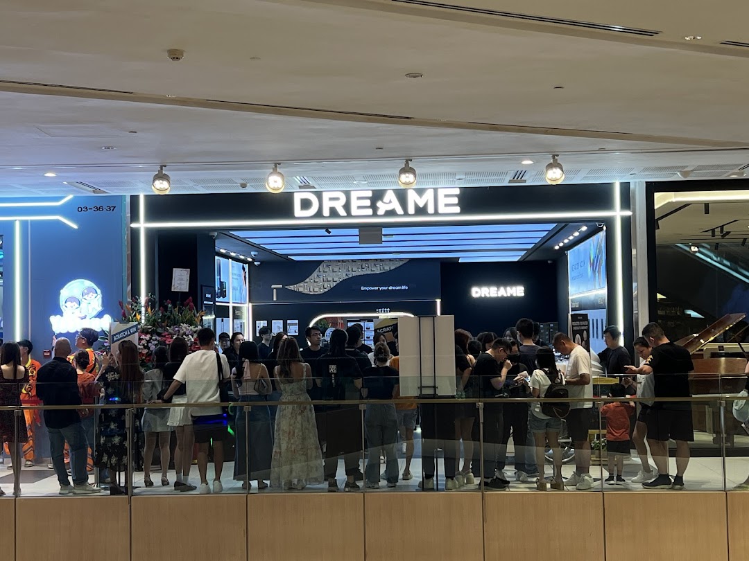 A bustling shop front of Dreame at Westgate with a crowd of customers gathered outside.