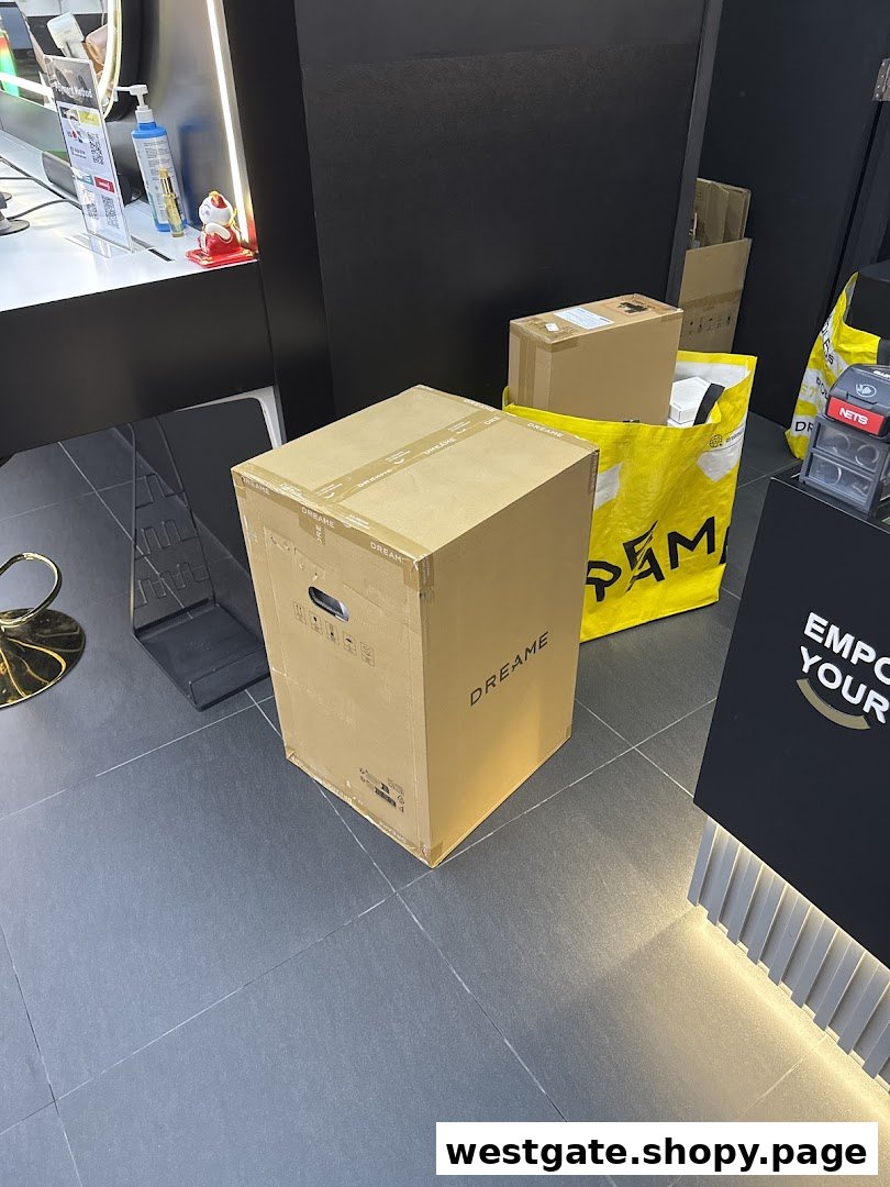 Interior shot of Dreame Westgate showing product boxes and a yellow branded bag on the floor.
