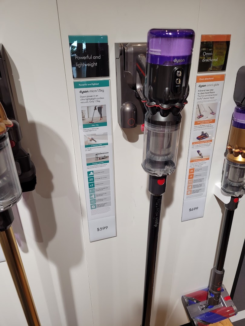 Dyson micro 1.5kg and Omni-glide vacuum cleaners displayed with product features and prices.
