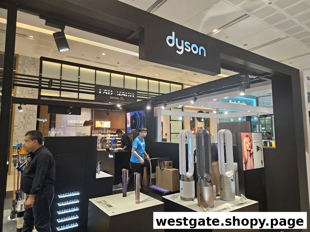 An interior view of the Dyson store showcasing innovative home technology products and staff.