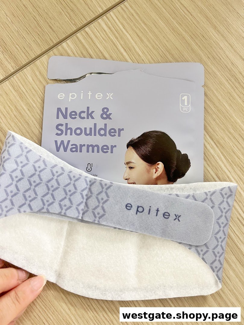 Close-up of an Epitex Neck & Shoulder Warmer product and its packaging on a wooden surface.