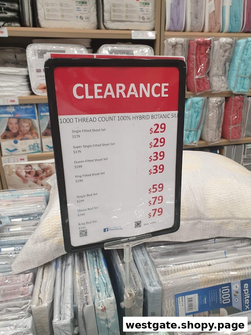A clearance sale sign for 1000 thread count hybrid botanic silk bedding at Epitex.