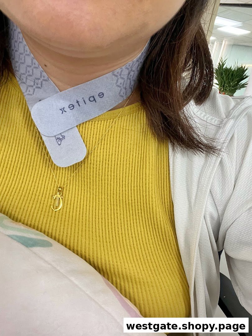 A person wearing a grey neck product with the Epitex logo, showcasing comfort and quality.