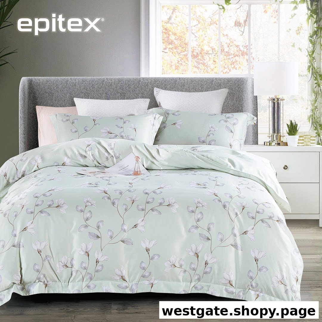A beautifully made bed featuring light green floral bedding from Epitex, set in a bright bedroom.