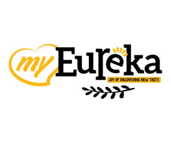 The official logo for Eureka Popcorn, featuring 'my Eureka' with a heart and the tagline 'JOY OF DISCOVERING NEW TASTE'.
