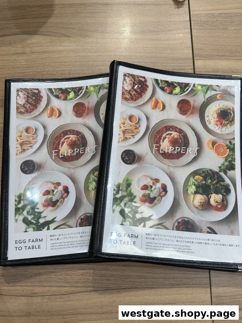 Two open menus from FLIPPER'S showcasing various egg-based dishes, pancakes, and their 'Egg Farm to Table' concept.