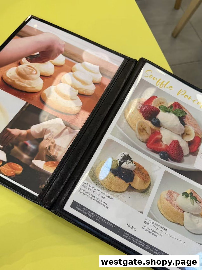 A menu displaying various fluffy souffle pancakes with different toppings and prices.