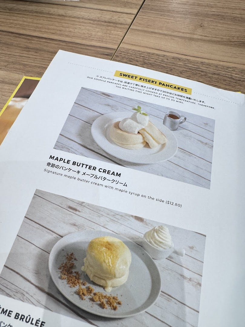 A menu page from Flippers Westgate showcasing their signature soufflé pancakes.