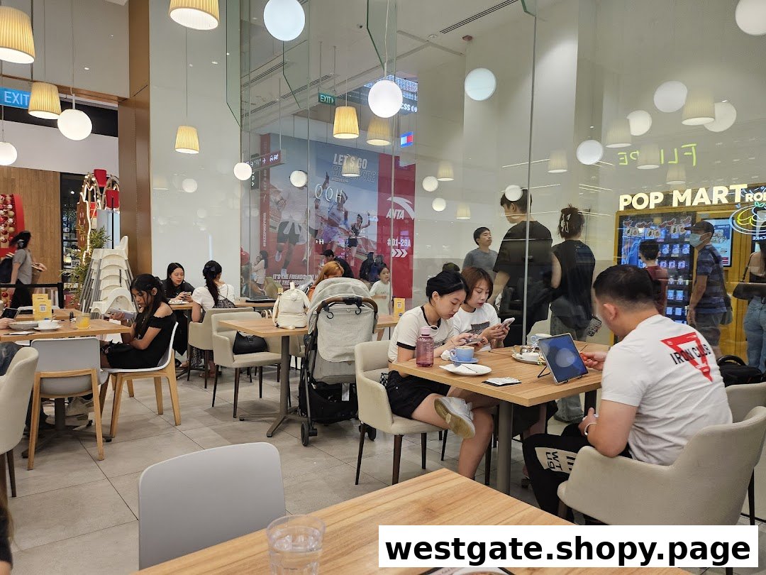 Customers enjoy a bright, modern cafe interior at Flippers Westgate, with ample seating and natural light.