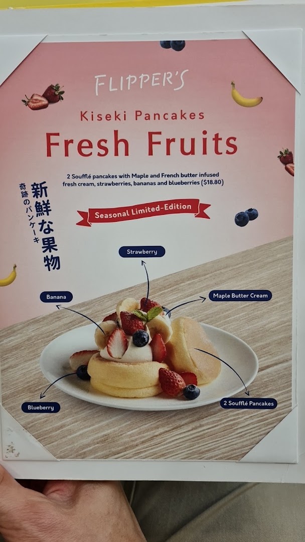 A menu displaying Flippers' Fresh Fruits Kiseki Pancakes with detailed ingredients and price.