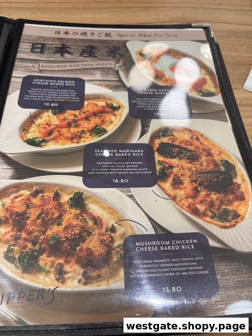 A menu page from Flippers Westgate showcasing various Japanese baked rice dishes with cheese.