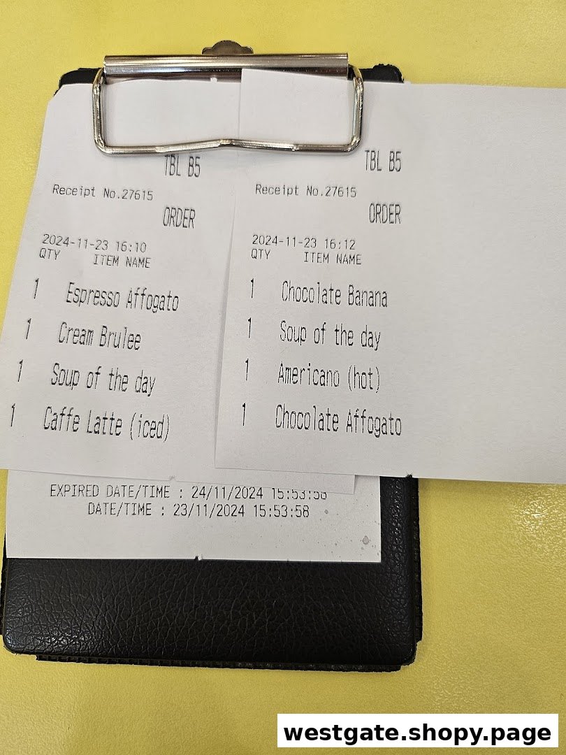 Two order slips from Flippers Westgate displaying a variety of food and drink items.