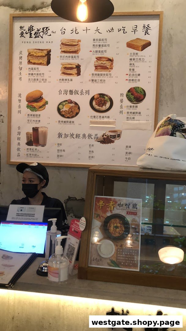 A comprehensive menu board displaying Taiwanese and Singaporean breakfast items and drinks at Fong Sheng Hao.