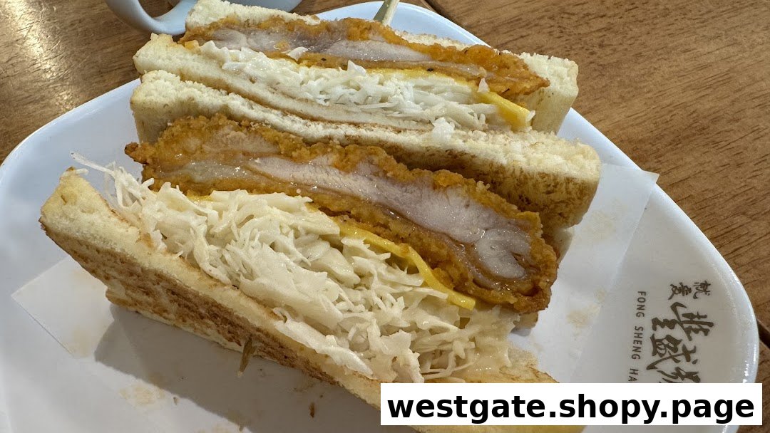 A delicious fried pork chop sandwich with shredded cabbage and cheese on toasted bread.