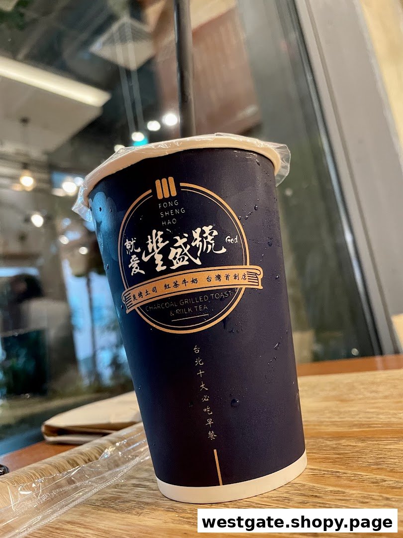 A close-up of a refreshing milk tea cup from Fong Sheng Hao, featuring its distinctive branding.