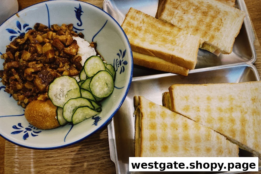 A delicious Taiwanese braised pork rice bowl with cucumber and egg, alongside toasted sandwiches.