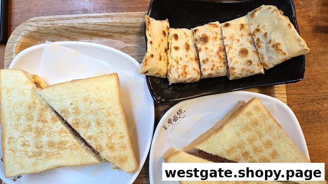 Delicious toast sandwiches and savory flatbread rolls served on a wooden table.