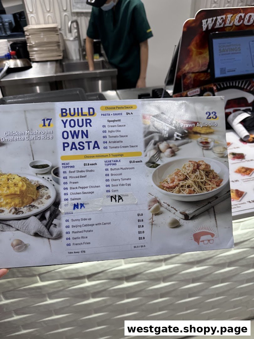 A close-up of a 'Build Your Own Pasta' menu with various options and prices, at a food stall.