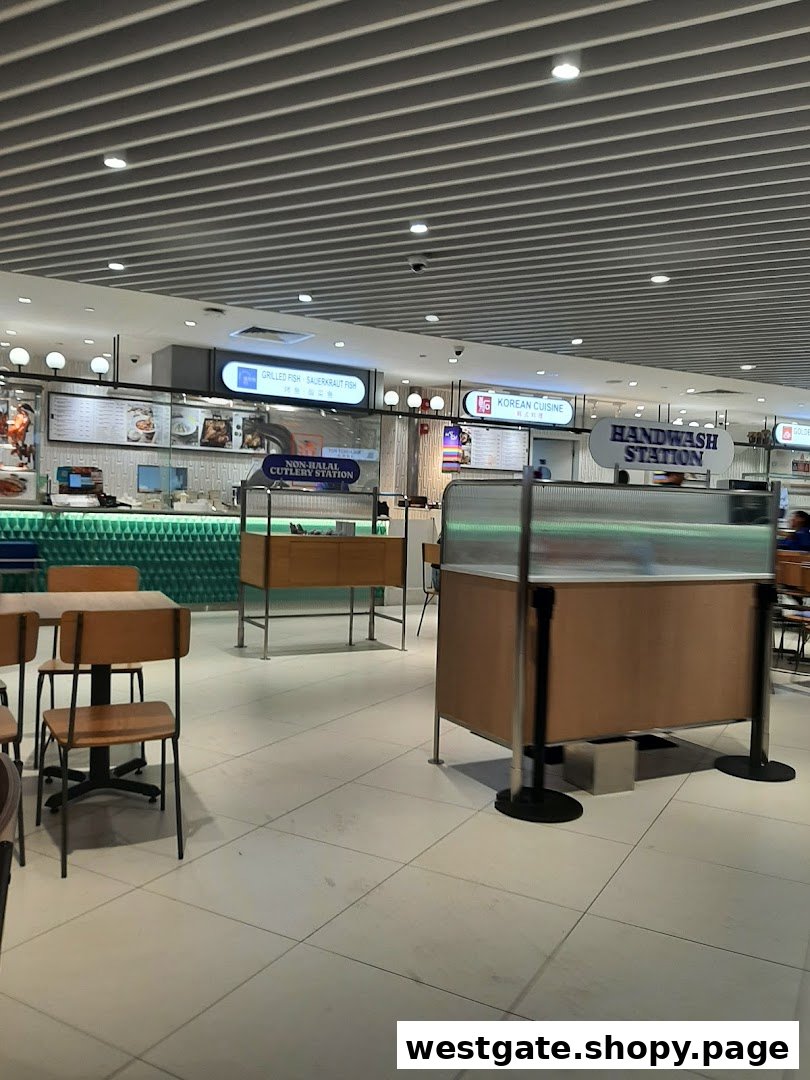 A spacious and modern food court interior with various food stalls and dining areas.