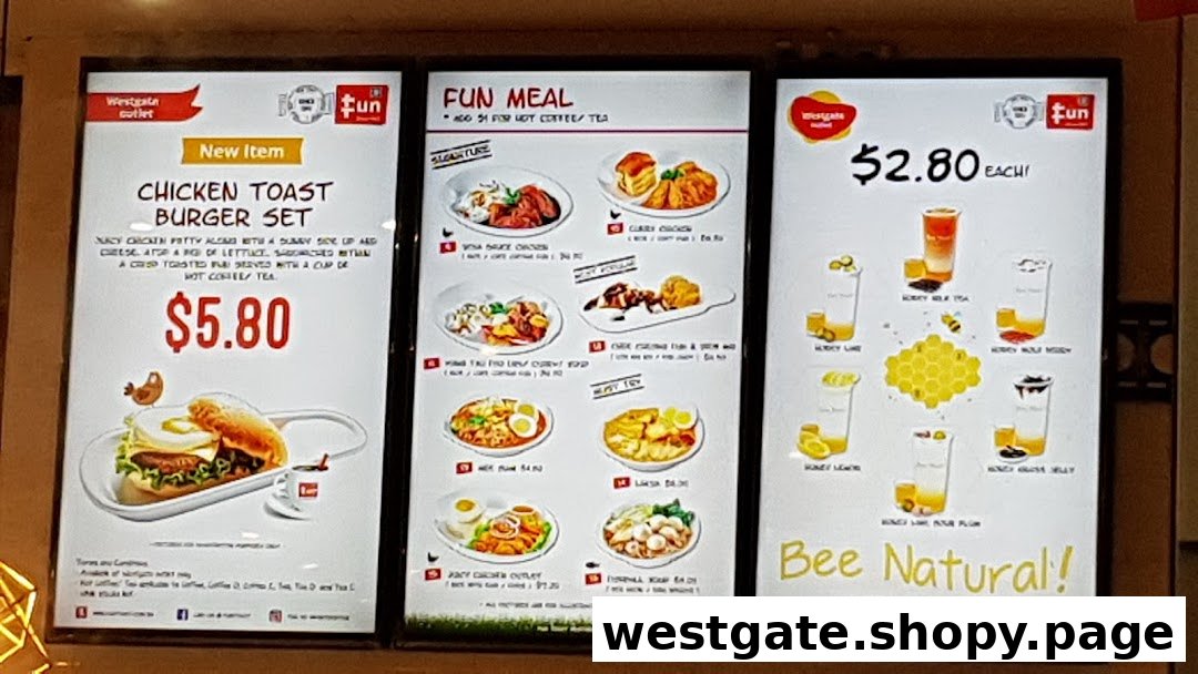 A brightly lit menu board for Fun Toast, showcasing new items, fun meals, and honey-based drinks.