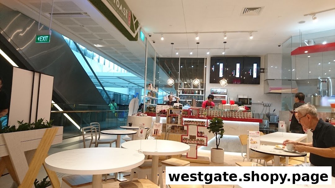 Interior view of Fun Toast cafe with customers, staff, and a bright, inviting seating area.