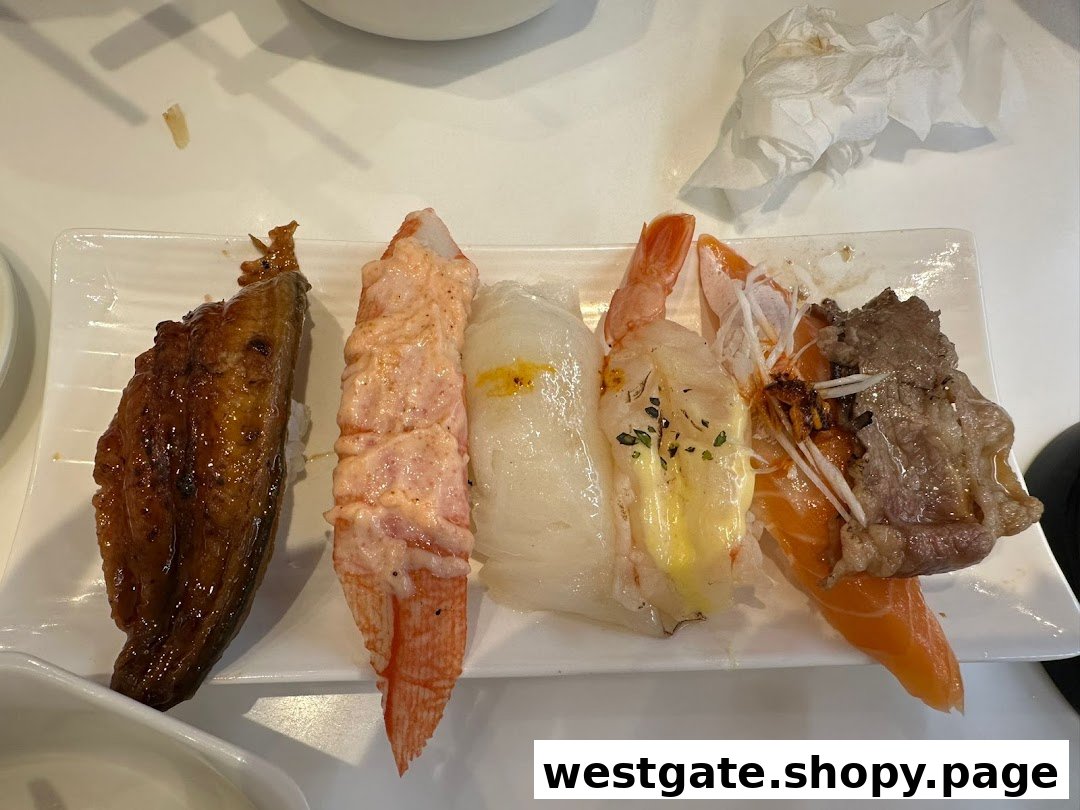 A white plate holds a variety of delicious sushi pieces, including eel, crab, and salmon.