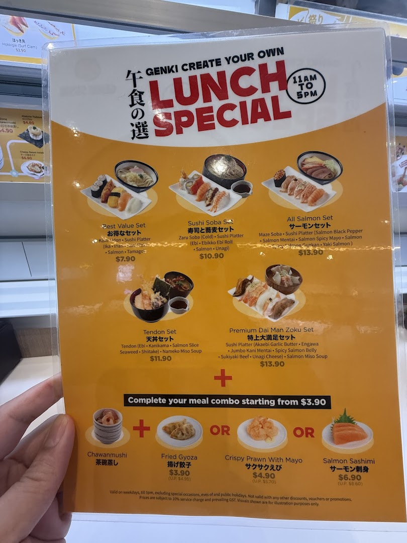 A close-up view of Genki Sushi's 'Lunch Special' menu board, featuring various sushi and noodle sets.