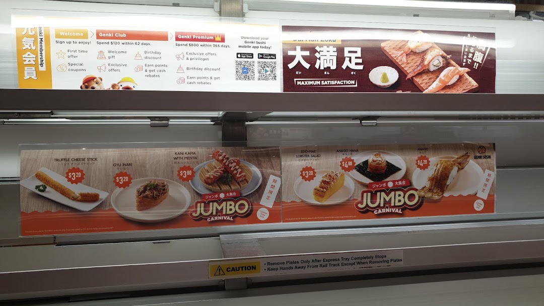 A display showcasing Genki Sushi's special menu items, prices, and membership benefits within the restaurant.