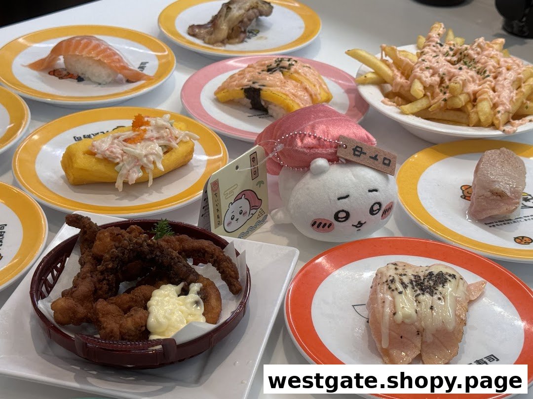 A table filled with various sushi dishes, fried food, fries, and a cute plush toy at Genki Sushi.