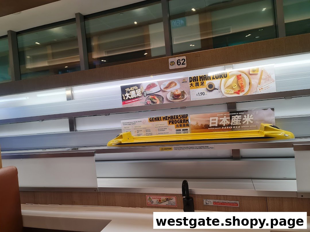 Interior view of Genki Sushi's express delivery system with promotional displays and seating.