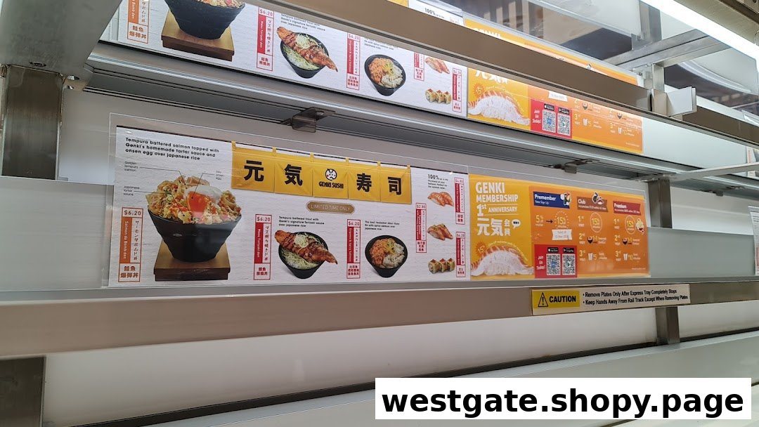 A display board showcasing Genki Sushi's menu items, prices, and membership promotions.
