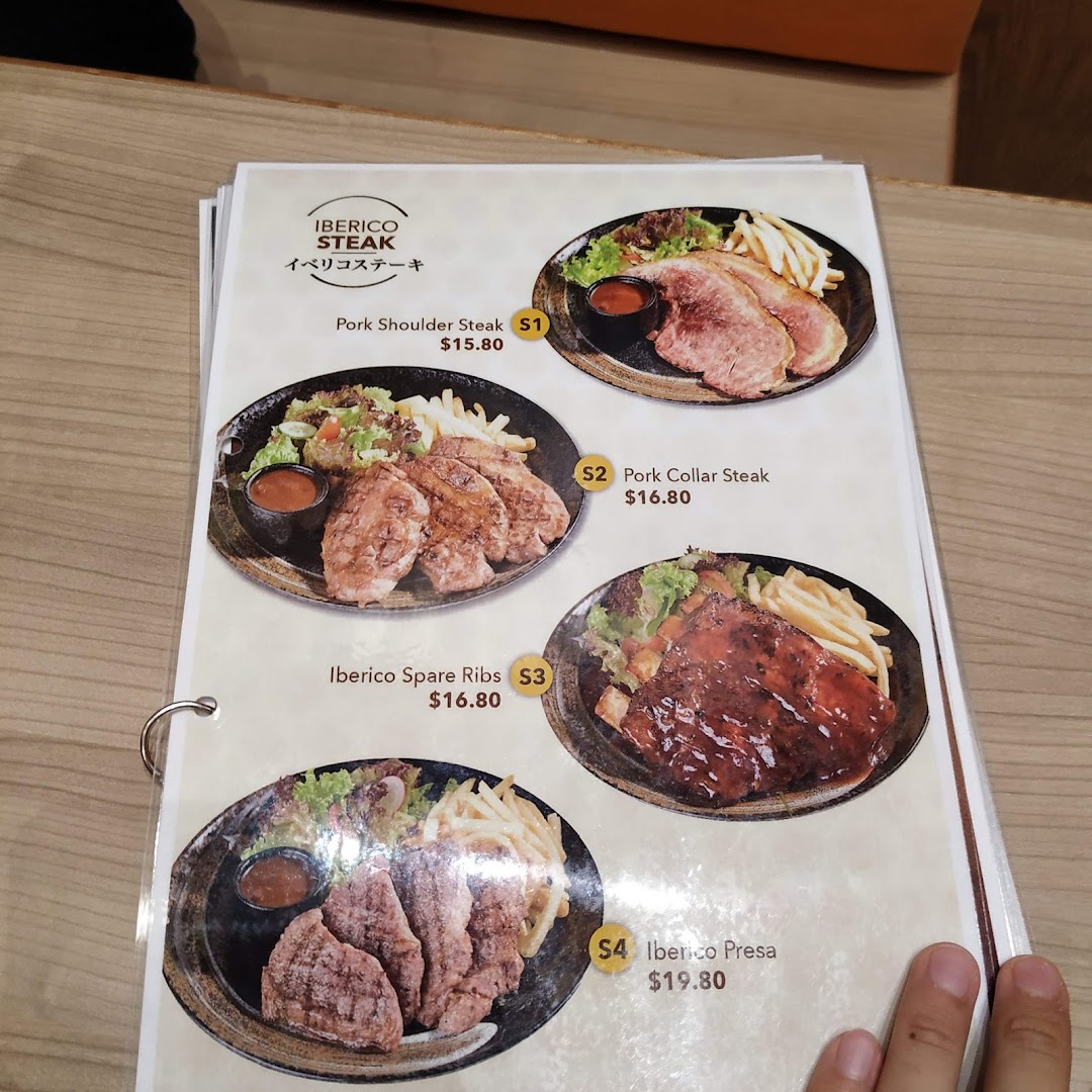 A menu page from Gochi-So Shokudo showcasing Iberico pork steak and rib dishes with prices.