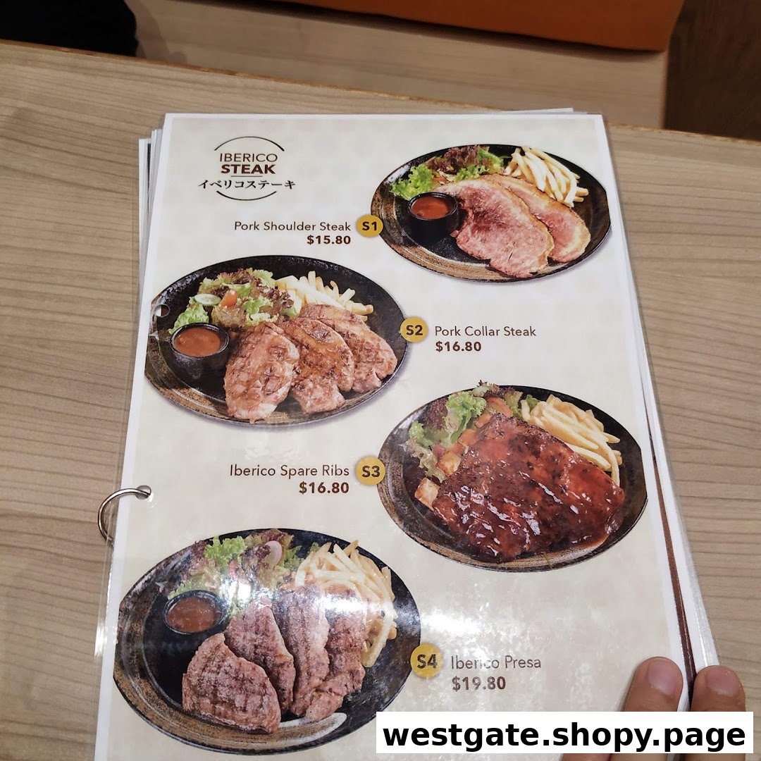 A menu page from Gochi-So Shokudo showcasing Iberico pork steak and rib dishes with prices.