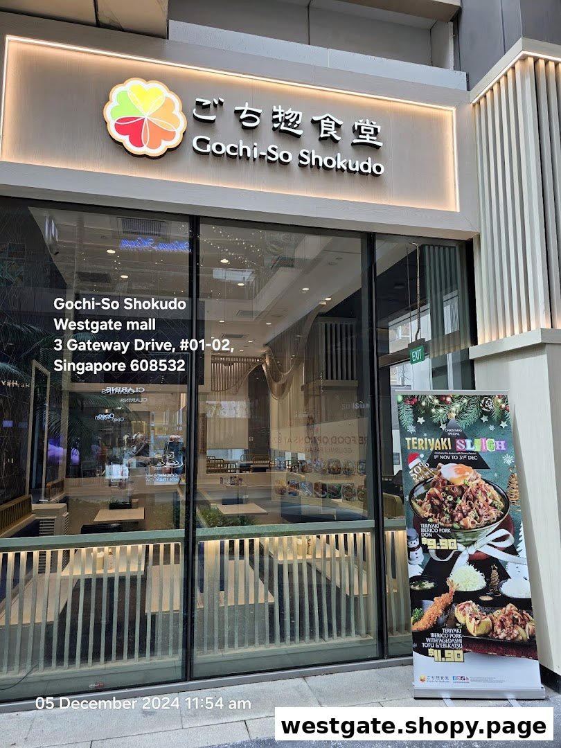 The inviting exterior of Gochi-So Shokudo, a Japanese restaurant, featuring its entrance, signage, and a promotional banner.