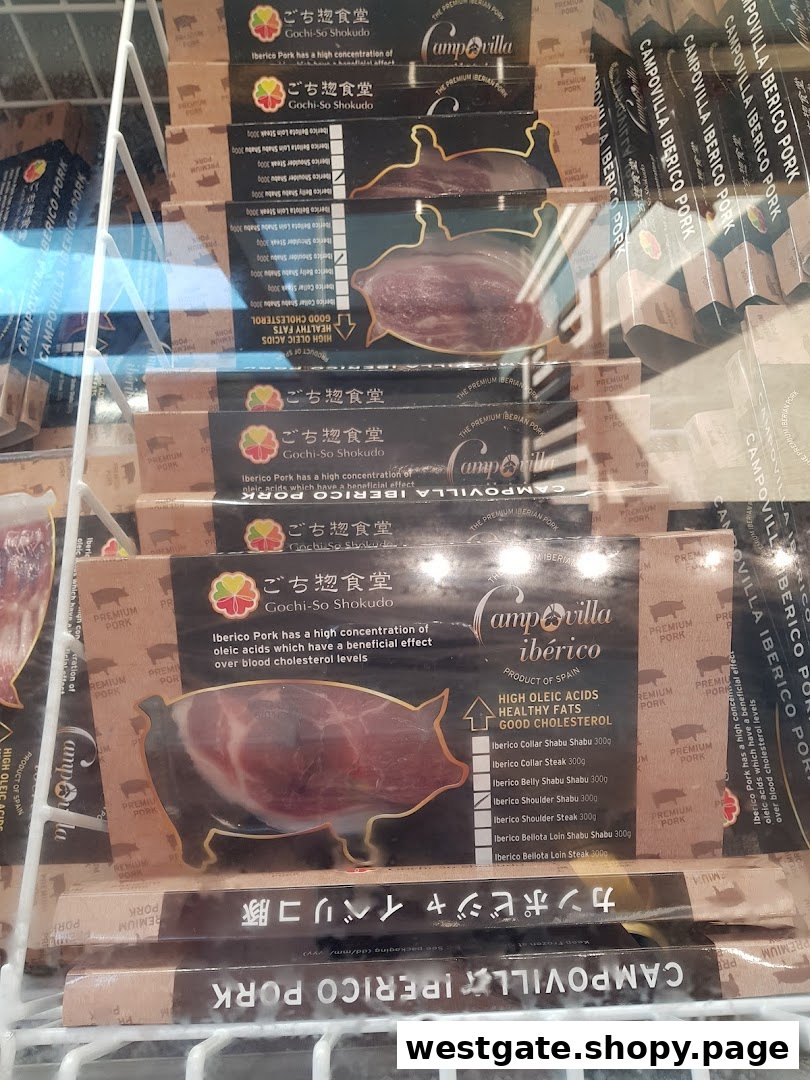 A freezer display showcasing various cuts of premium Gochi-So Shokudo Campovilla Iberico pork products.