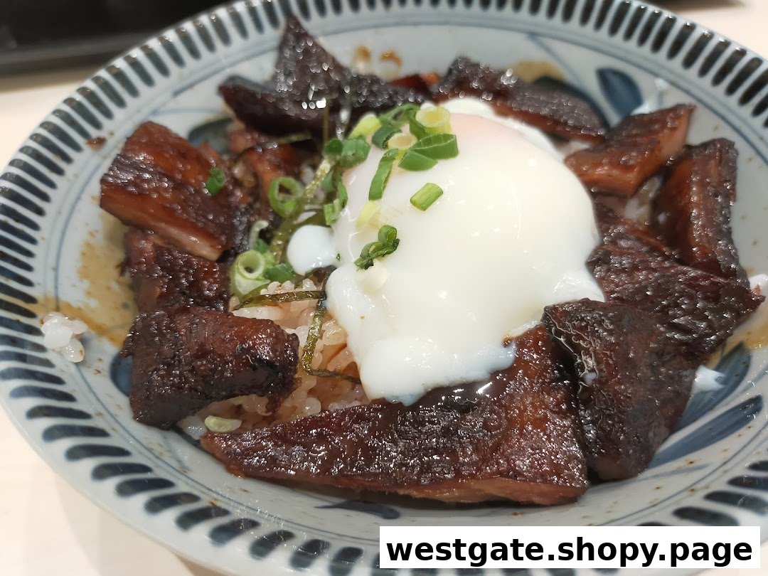 A close-up of a delicious Japanese rice bowl featuring tender braised meat and a perfectly poached egg.