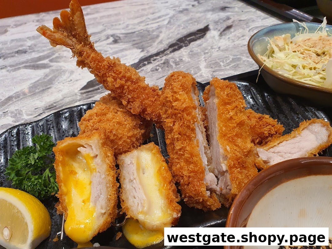 A plate of crispy fried tonkatsu, cheese cutlet, and ebi fry with a side salad.