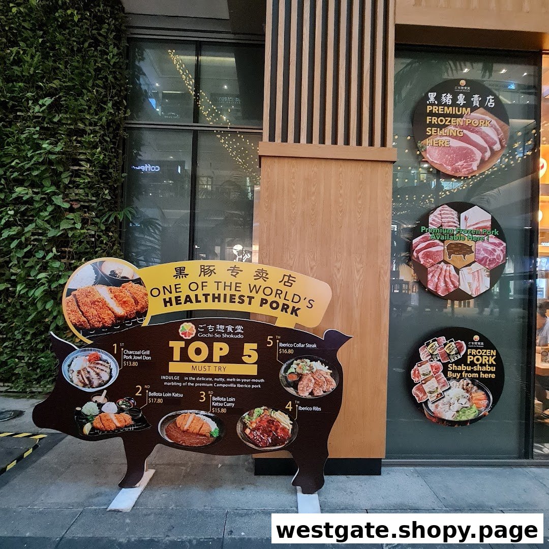 The shop front of Gochi-So Shokudo, featuring a pig-shaped display with 'Top 5 Must Try' Iberico pork dishes.