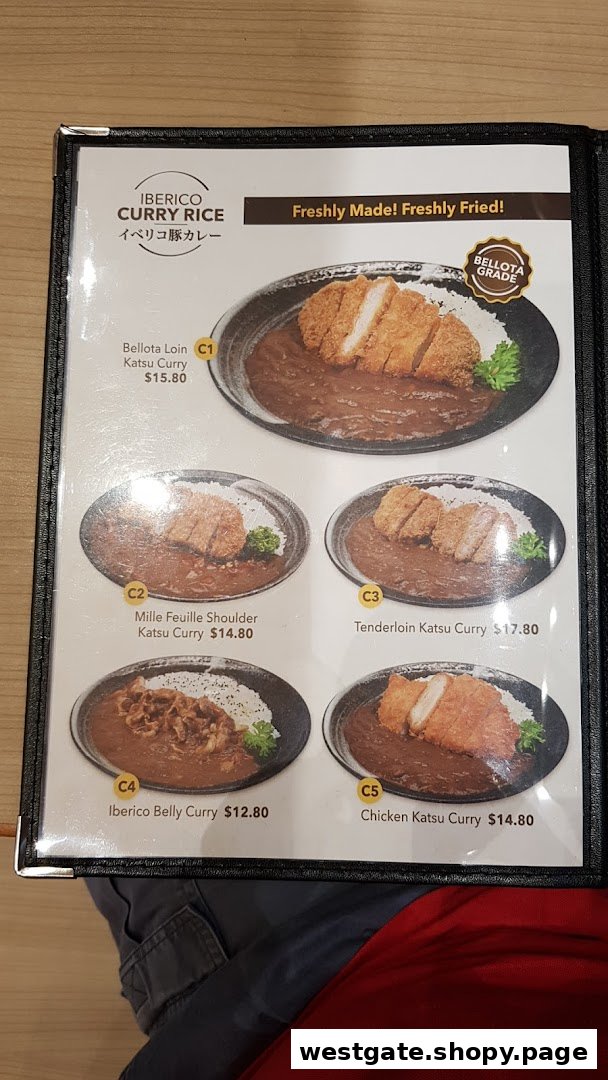 A menu page showcasing various Iberico and chicken katsu curry rice dishes with prices.