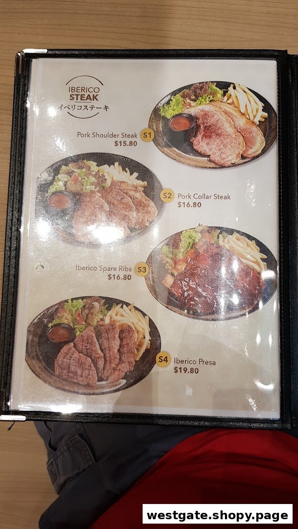 A menu page showcasing various Iberico pork steak and rib dishes with prices.