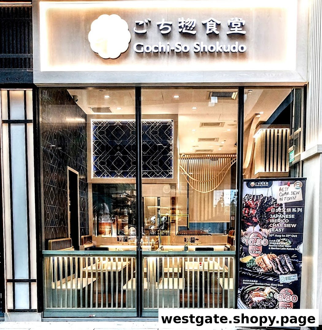The illuminated storefront of Gochi-So Shokudo, showcasing its entrance and a promotional banner.