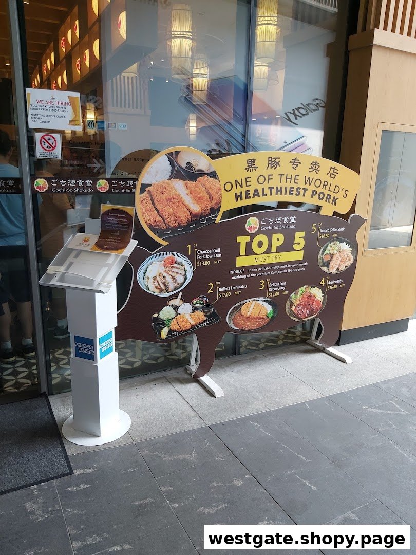 A shop entrance featuring a pig-shaped display board showcasing Gochi-So Shokudo's top pork dishes and prices.