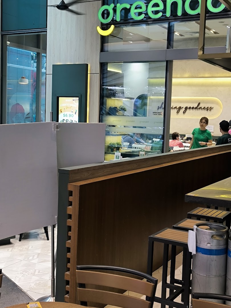 The shop front of Greendot Westgate, showing its entrance and interior.