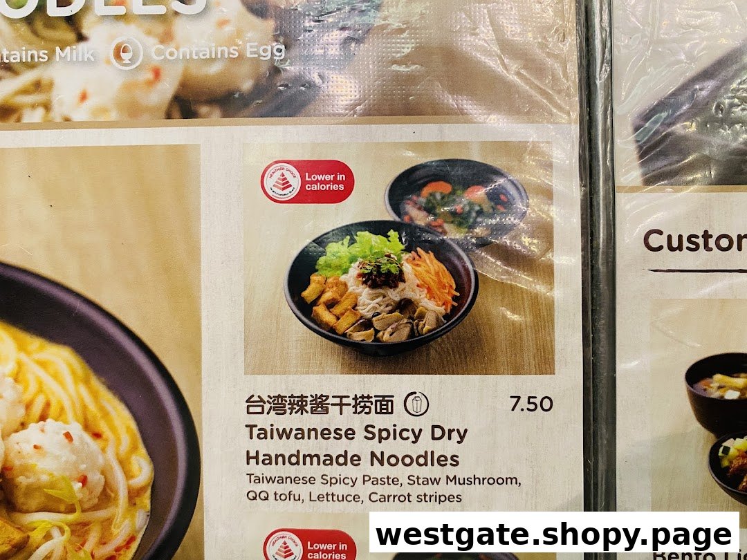 Close-up of Greendot's menu featuring Taiwanese Spicy Dry Handmade Noodles with ingredients and price.