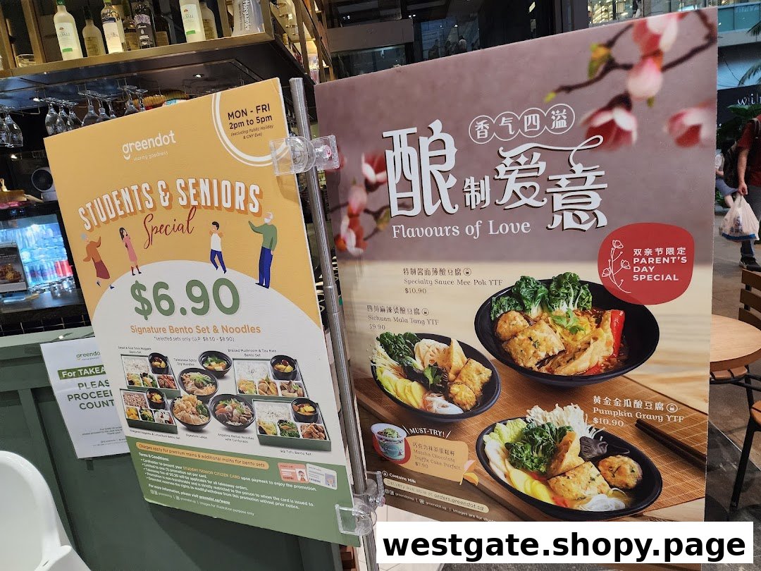 Two promotional boards at Greendot showcasing special meal deals and new menu items.