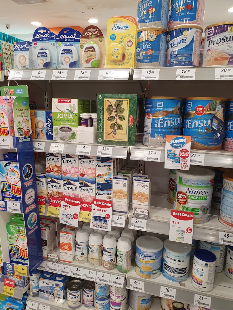 Shelves stocked with various health and wellness products, including nutritional supplements and sweeteners.