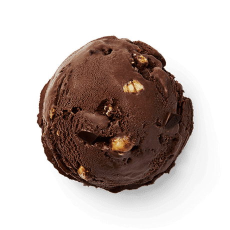 A scoop of rich chocolate ice cream with nuts and chocolate pieces.